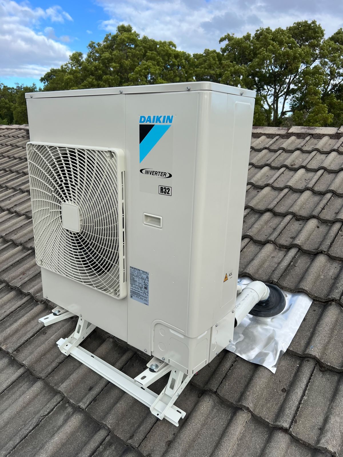 Wall-mounted climate controller set to a comfortable temperature